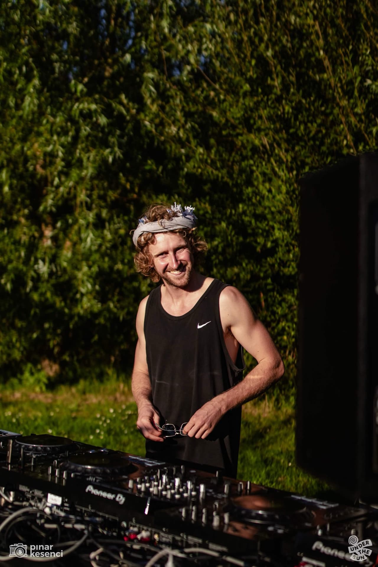 Henners DJing outside at Under the Sun